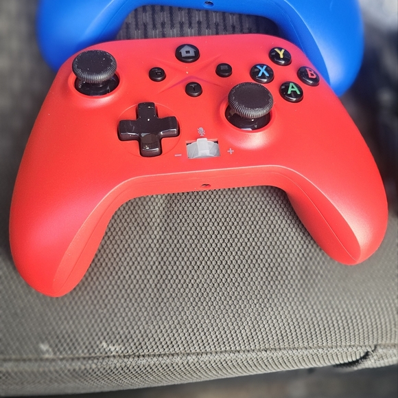 Vibrant Red and Blue Gaming Controllers - Picture 3 of 16